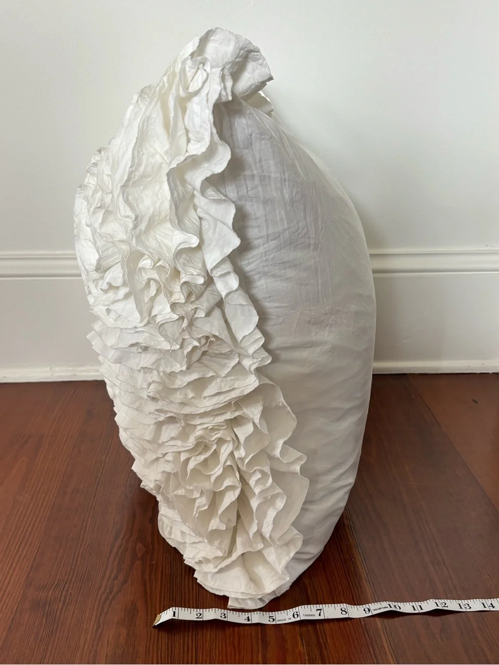 White ruffle pillow